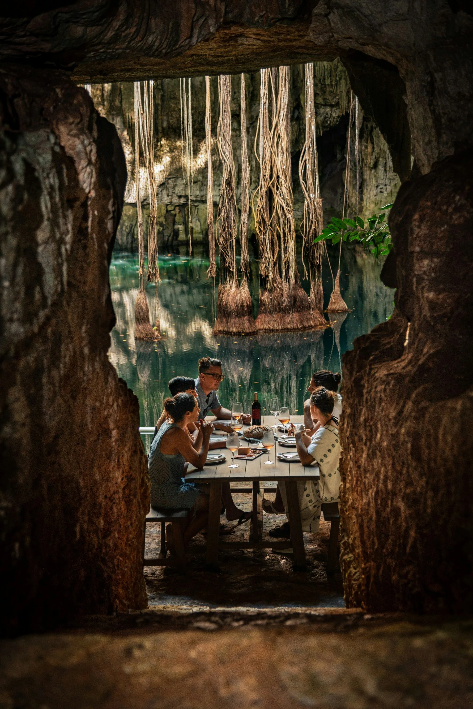An intimate dinner for two by candlelight in a hidden cenote setting